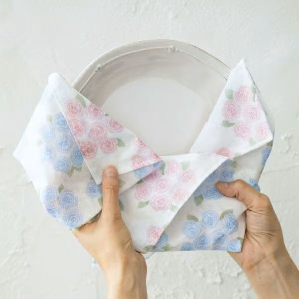 Shirayuki Fukin Tea Towel in Rose hanging to dry