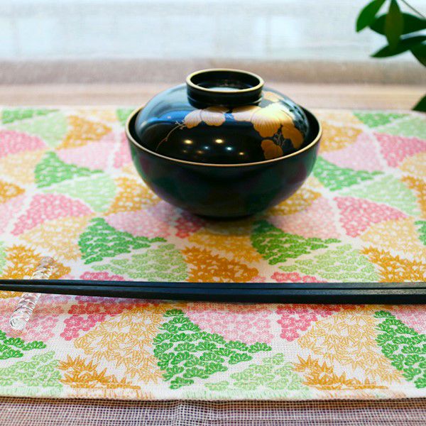 Shirayuki Fukin kitchen cloth in Shochikubai Pink, hanging to dry