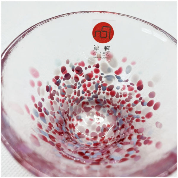 Close up Tsugaru Vidro Madai red sea bream glass sake cup, handmade in Aomori Japan